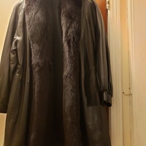 Leather jacket with fur collar